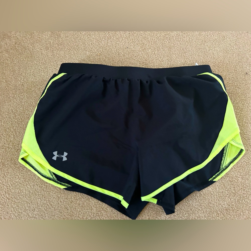 Black and neon yellow under Armour women’s shorts